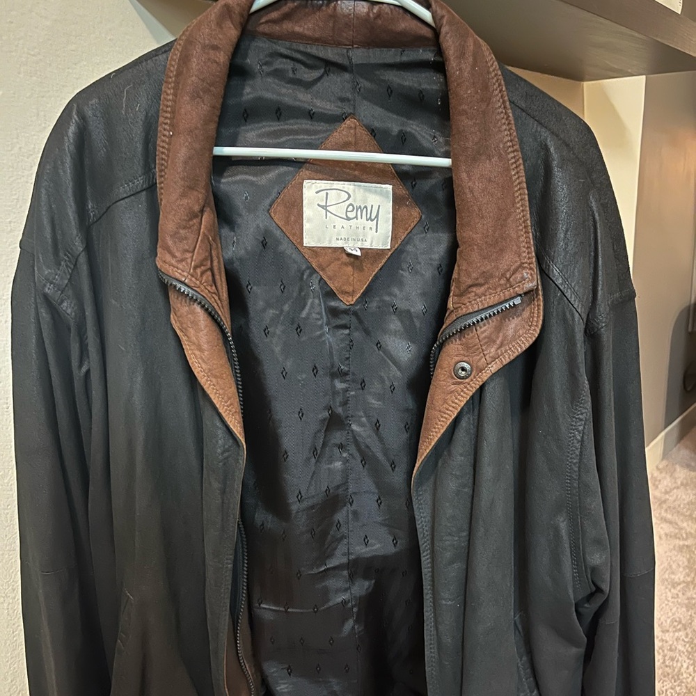 Remy Black Leather Jacket Size 44 with brown collar.
